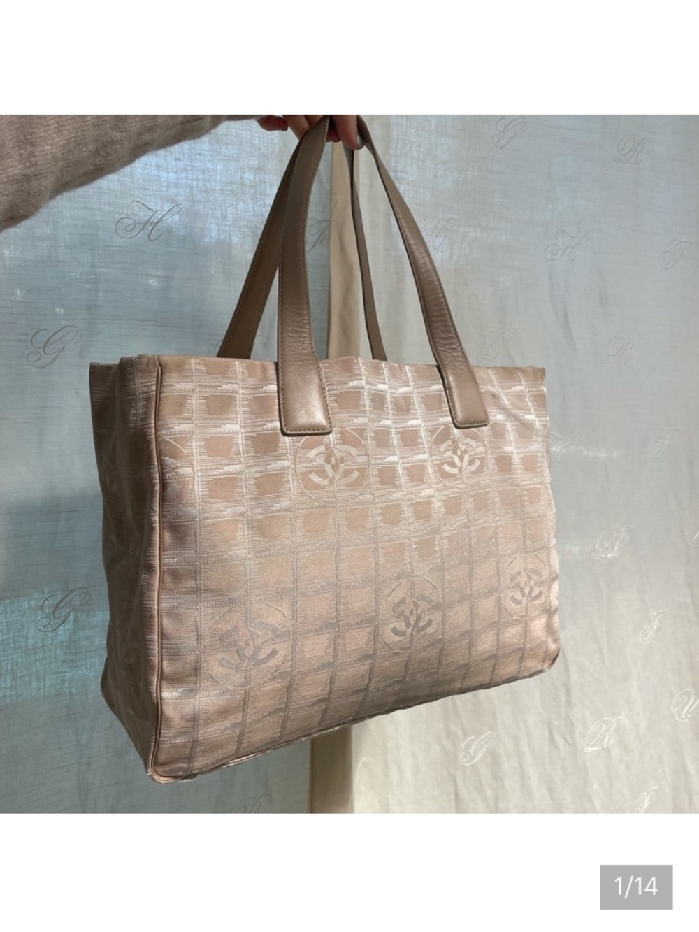 CHANEL Beige Travel line tote.
Authentic